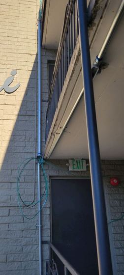 Conduit CAT6a Pull — Riser run down the building face